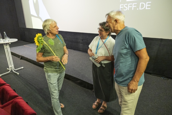 Regisseur Andreas Dresen, Moderatorin Anja Schmid und Festivalleiter Matthias Helwig (© Pavel Broz)